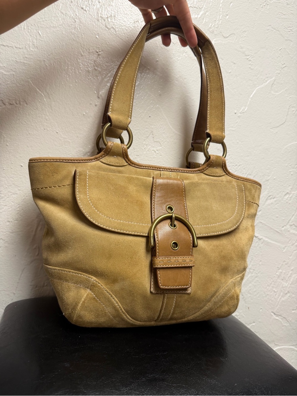 Vintage Coach Soho suede hobo shoulder bag featuring brass hardware